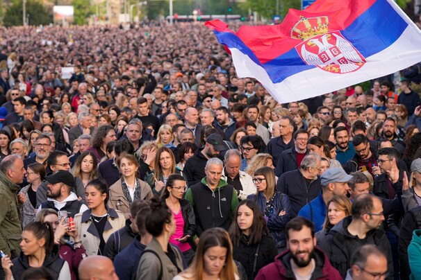 Thousands march in silence in Serbia after mass shootings